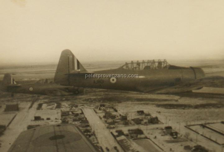 Peter Provenzano Photo Album Image_copy_129.jpg - North American Harvard IIB (AT-6A). Advance trainers of the Royal Canadian Airforce (RCAF) in flight over Saskatchewan Canada, 1942.